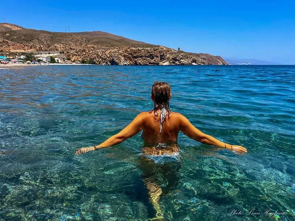 swimming in crystal clear water