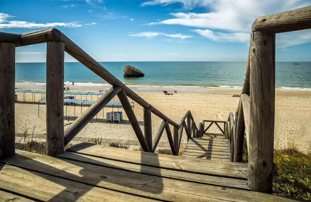 Matalascañas beach down a set of wooden stairs. This is one of the best beaches close to Seville Spain