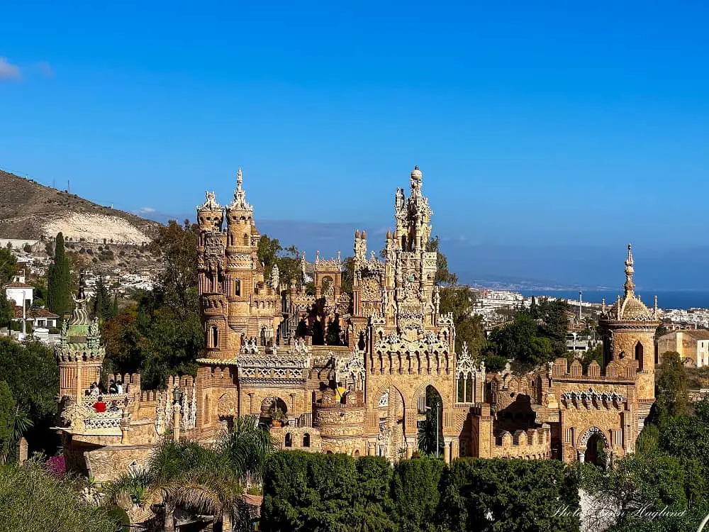 The fairytale Colomares Castle with spires and towers overlooking the Mediterranean is one of the top reasons to visit Benalmadena.