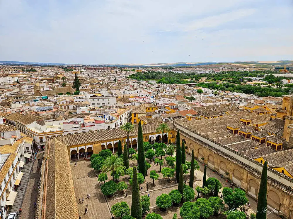 Views of Cordoba city and the orange garden of the Mosque-Cathedral.