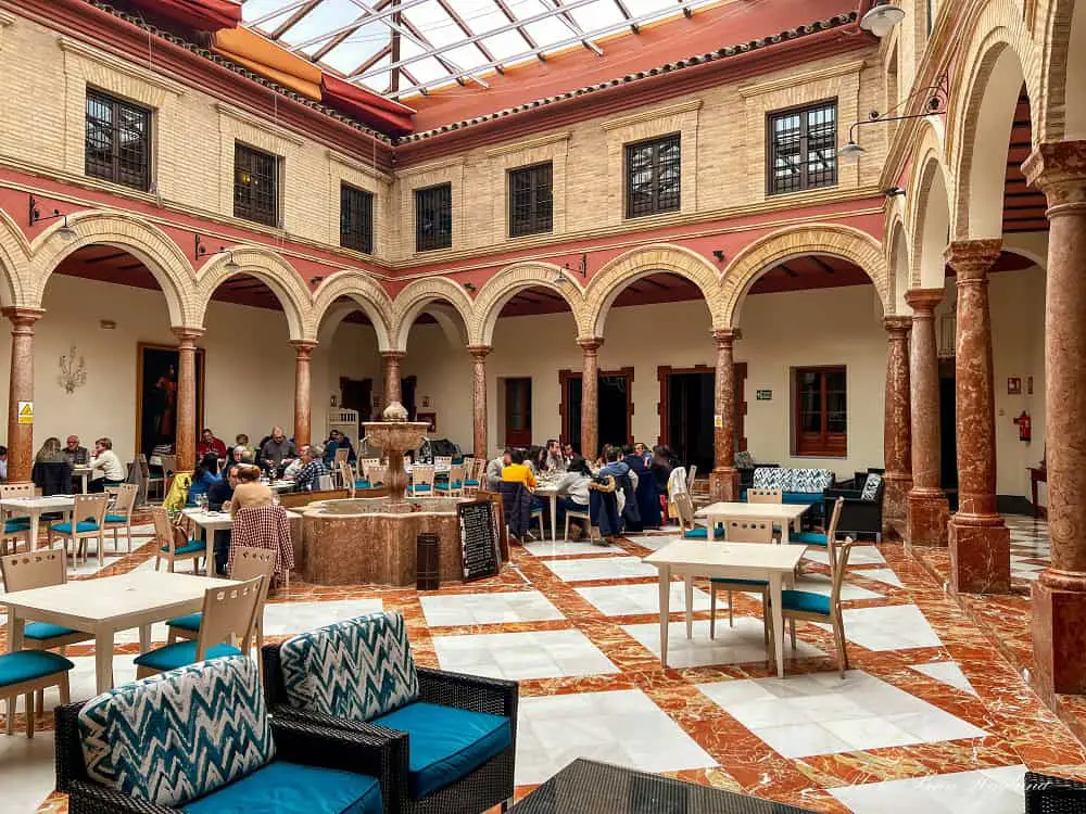 The porticoed courtyard of Hotel Santo Domingo Lucena Cordoba.