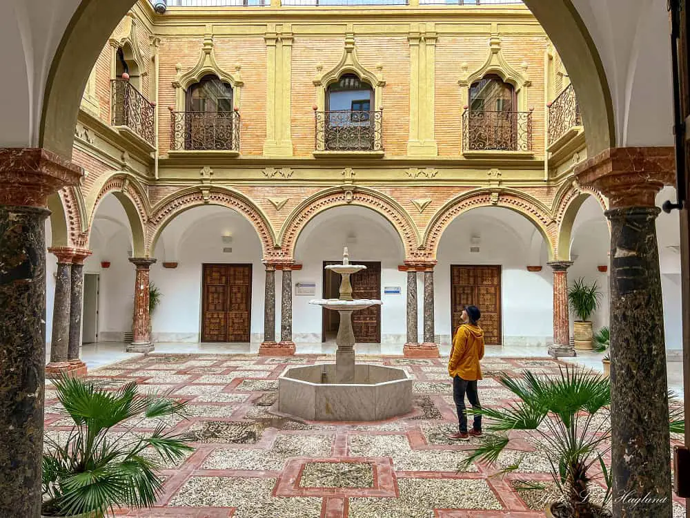 Me in the central courtyard of Palacio de Los Condes de Santa Ana Lucena.